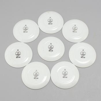 Eight porcelain coasters, Fornasetti, Milan, Italy.