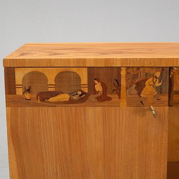 An inlaid bookcase from Mjölby Intarsia, 1930's.
