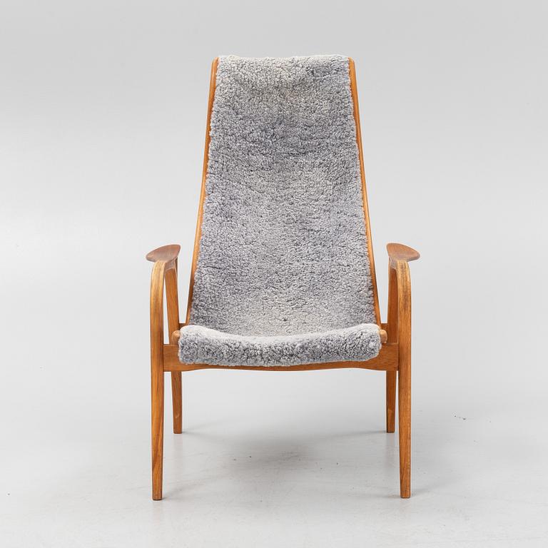 An Yngve Ekström Lamino sheepskin armchair from Swedese.