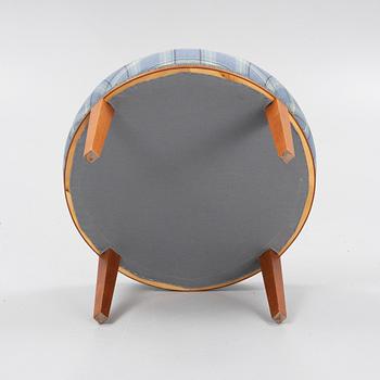 Josef Frank, a model 647 cherry wood stool by Firma Svenskt Tenn.