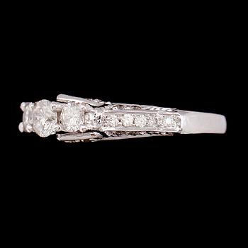 RING, 14 k rhodierat guld, briljantslipade diamanter tot 0.96 ct.