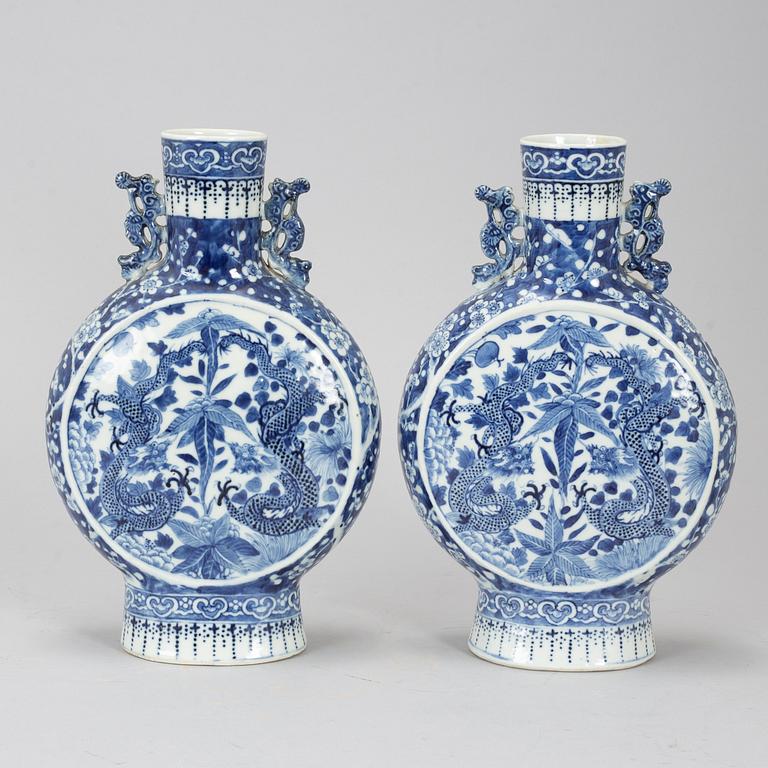 A pair of blue and white moonflasks, Qing dynasty, Qianlong (1736-95).