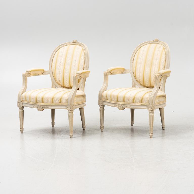 A pair of Gustavian style armchairs signed J.G.A, mid 20th century.