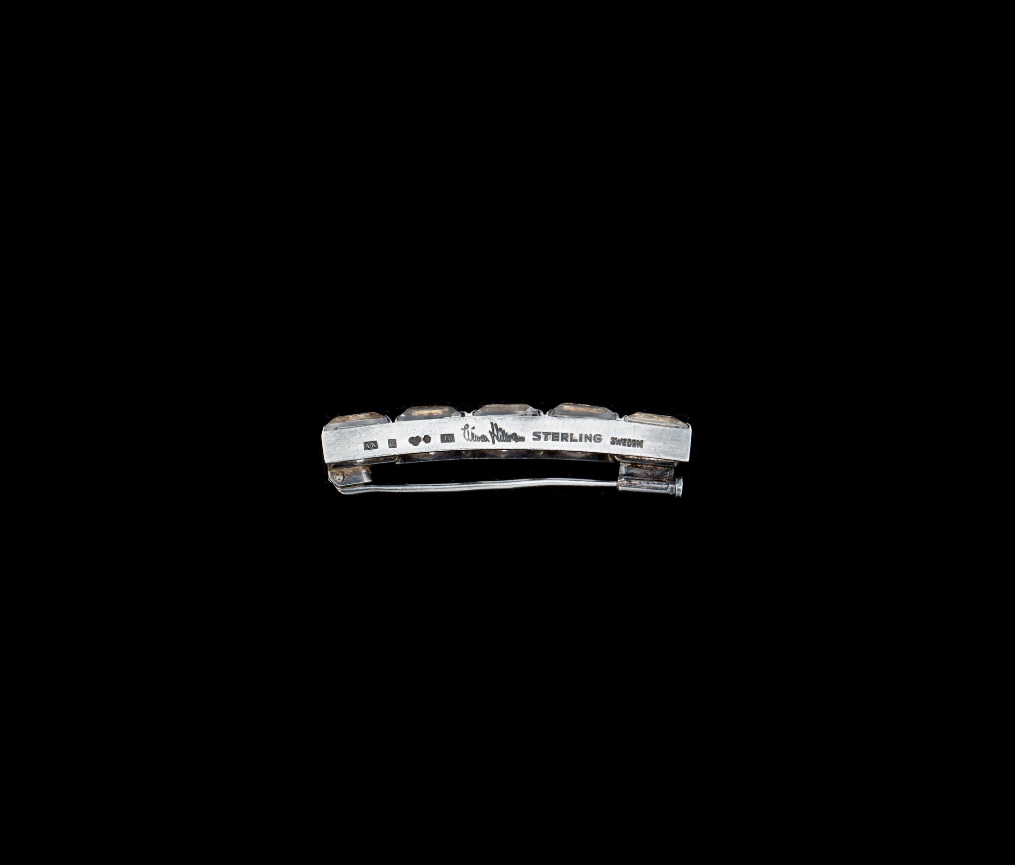 BROSCH, silver med bergkristall. Wiwen Nilsson, Lund 1942. Vikt ca 8 gram.