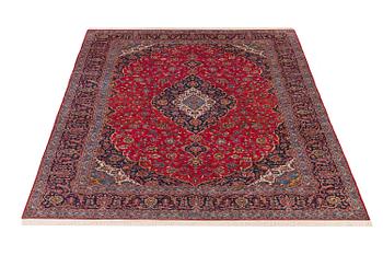 An old Keshan carpet ca 410 x 295 cm.
