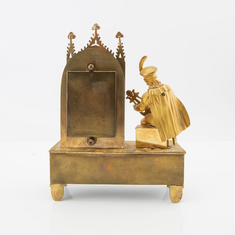 Neo-Gothic table clock, signed and dated in the work 1838.