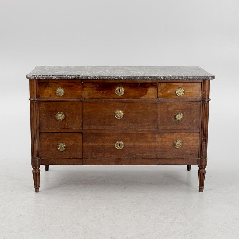 A Franch Directoire mahogany and marble commode, late 18th century.