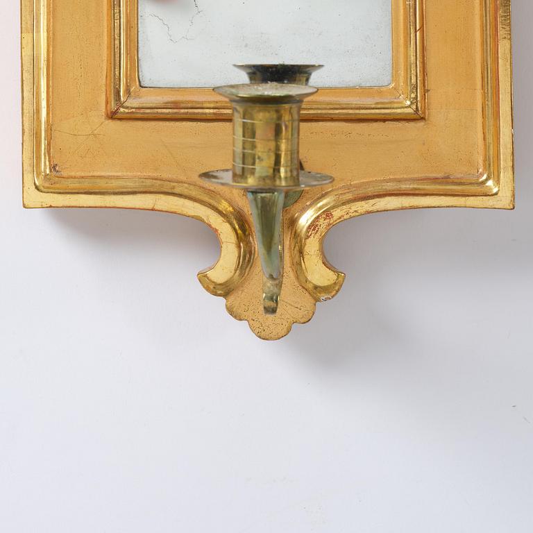 A pair of Gustavian giltwood one-light girandoles by J. P. Helin (master in Stockholm 1763-94).