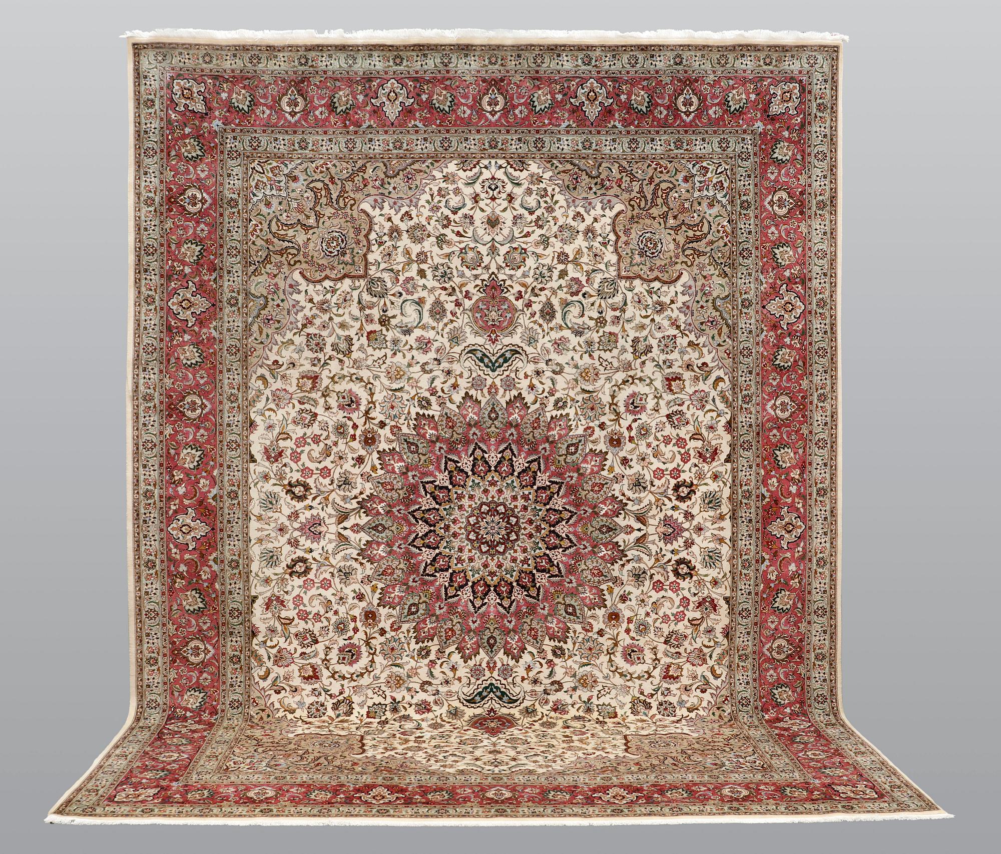 A carpet, Tabriz part silk, so called 50 Raj, cm 400 x 300 cm.