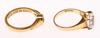 RINGAR, 4 st, 18K guld samt stenar, 1900-talets andra hälft. Tot vikt 25 gram.
