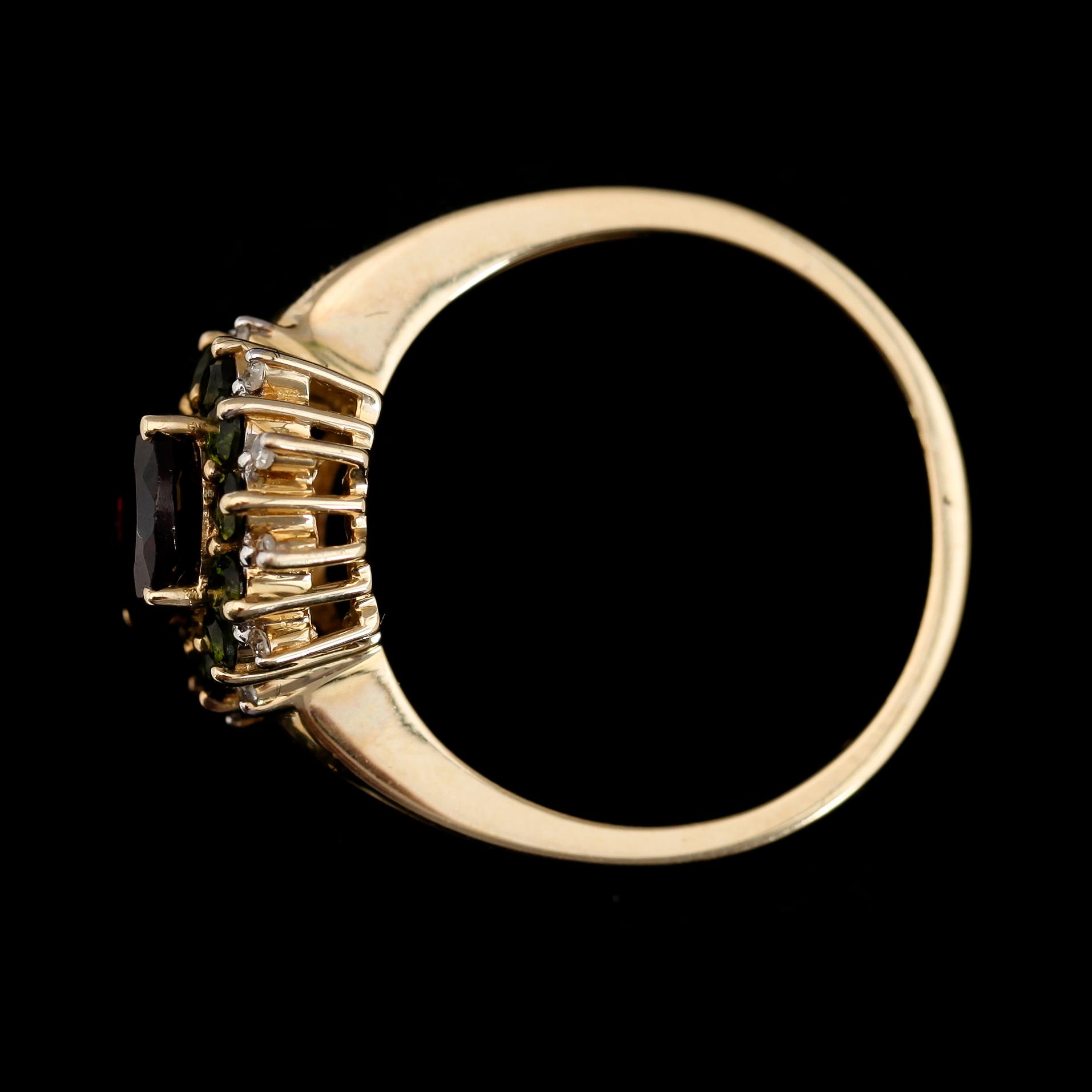 RING, 10K guld, diamanter tot ca 0.06 ct, granater och turmaliner.