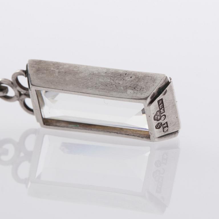 HÄNGE SAMT RING, sterlingsilver med bergkristall. Stigbert för Heribert Engelbert samt Wahlberg.