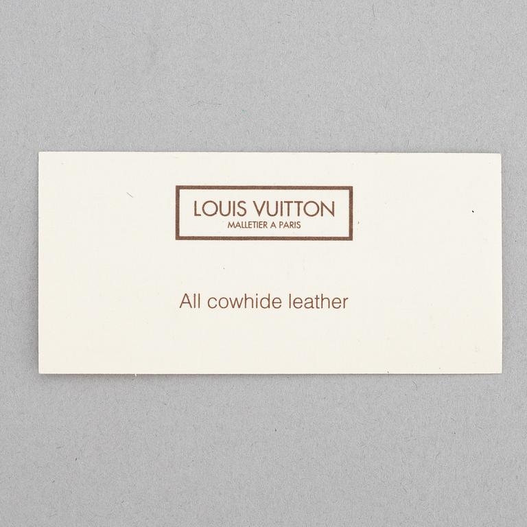 Louis Vuitton, a black, embossed leather wallet, 2015.