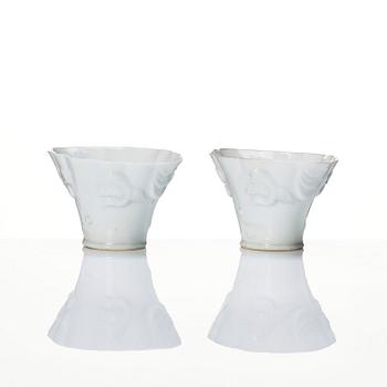 A pair of blanc de chine libation cups, Qing dynasty, 19th Century.