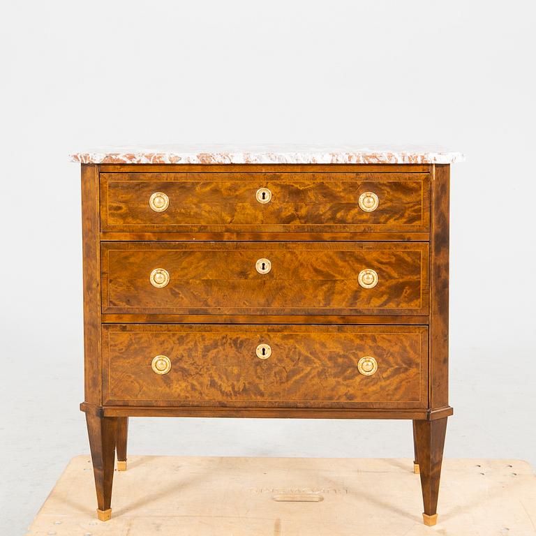 A Gustavian style mid 1900s mahogany dresser.