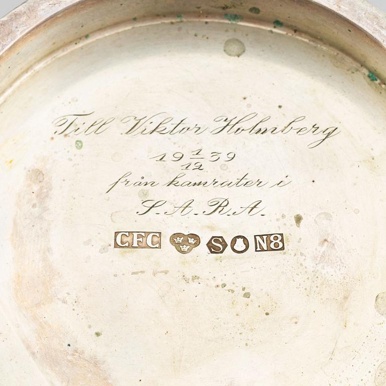 A silver beaker by C.F. Carlman, an inscription underneath, dated 1939.