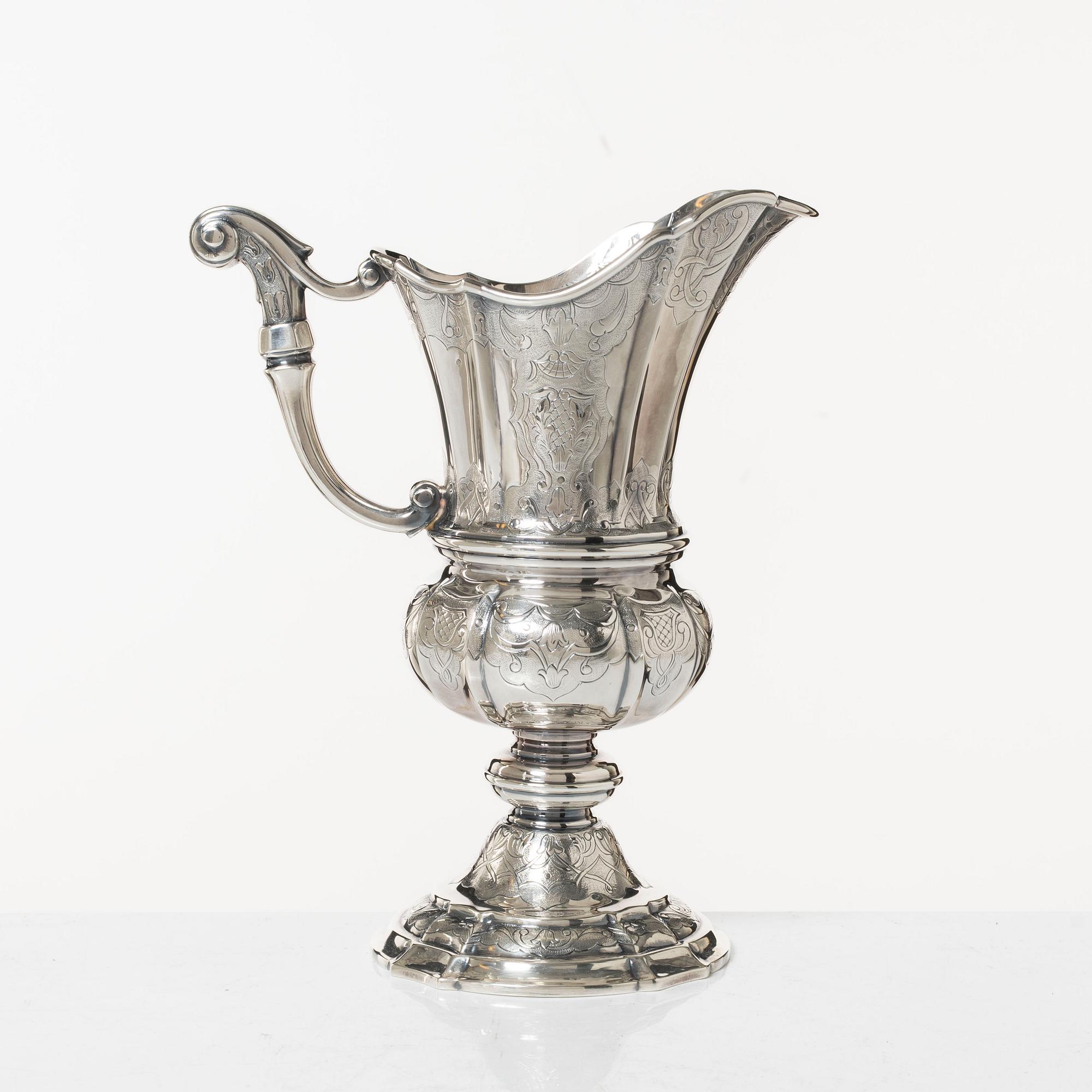 A sterling silver pitcher, Denmark, mid 20th Century.