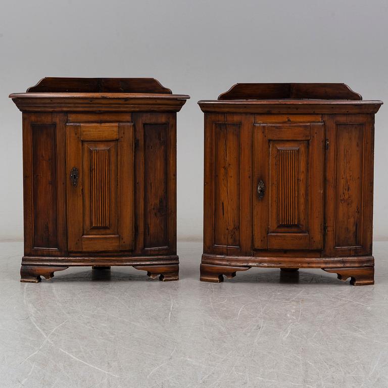 Two 19th century corner cabinets.