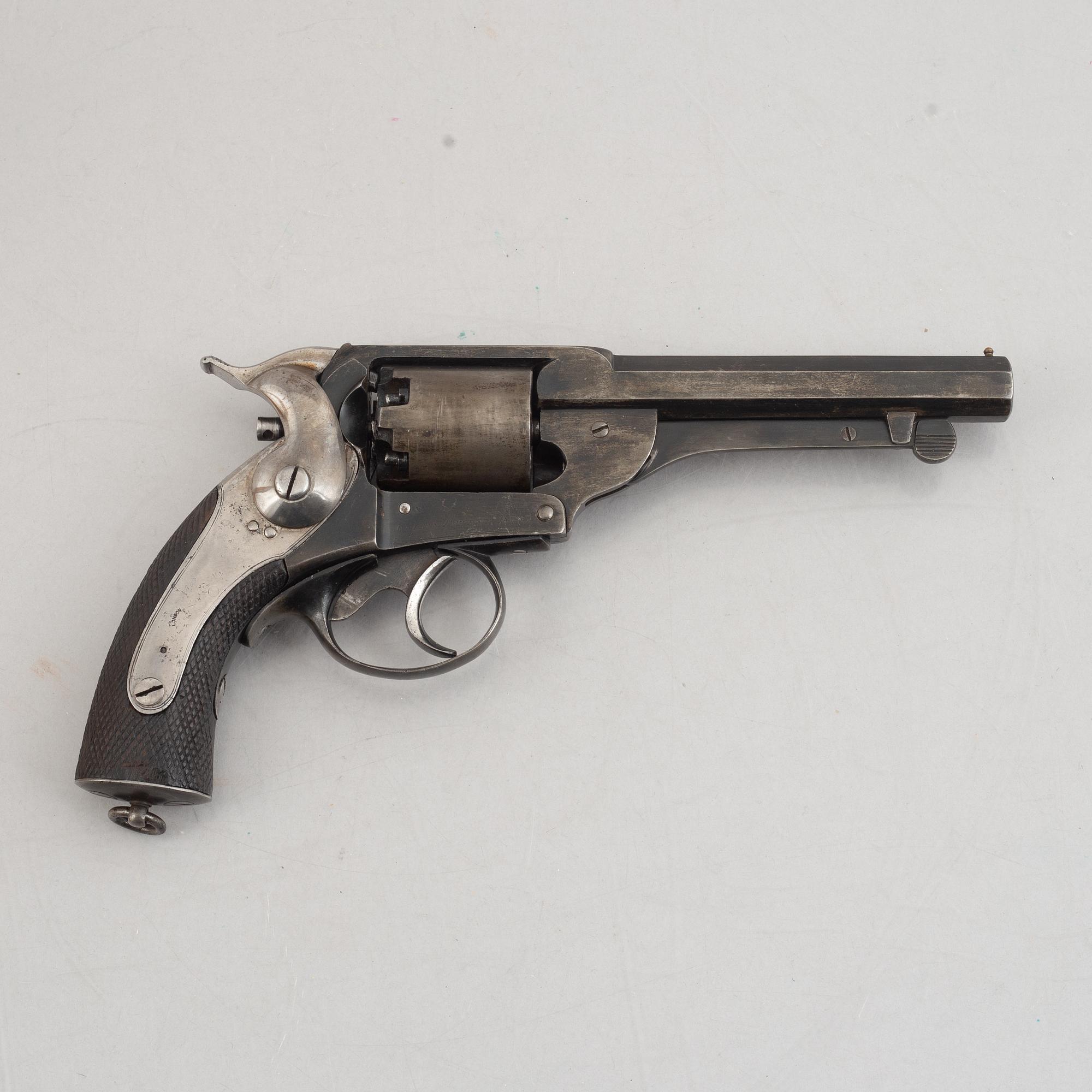 A cased Kerr patent double action percussion revolver. London Armoury Company. Serial no 11395.