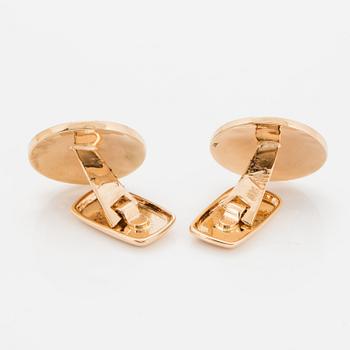 18K gold and black diamond cufflinks.