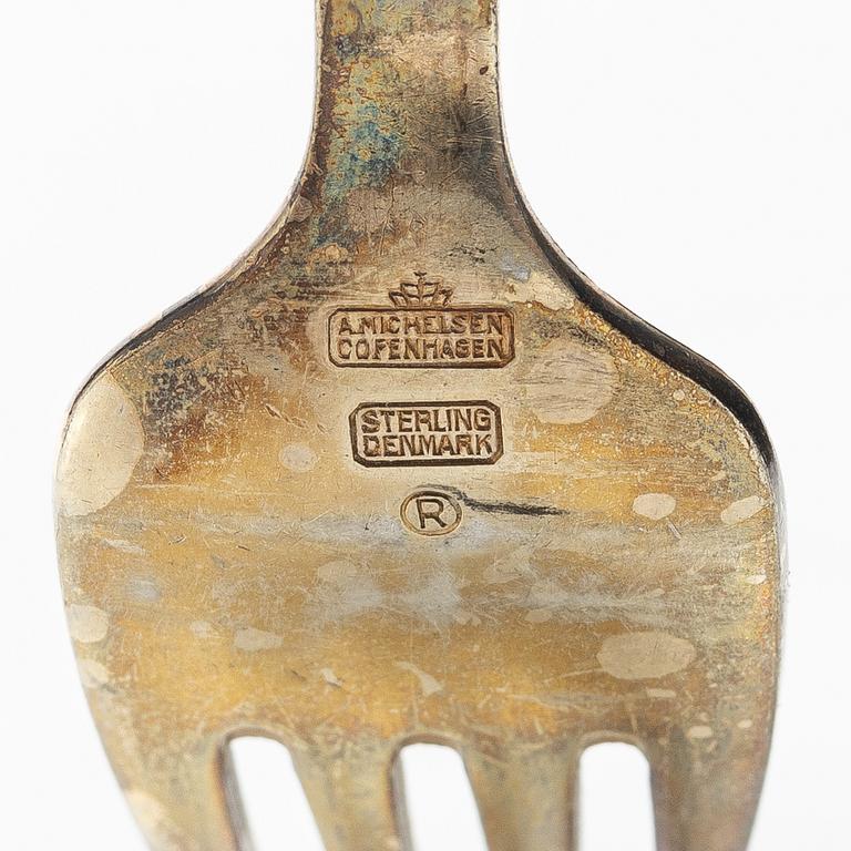 A set of sterling silver and enamel christmas cutlery, Michelsen, Denmark 1940s-1960s (34 pieces).