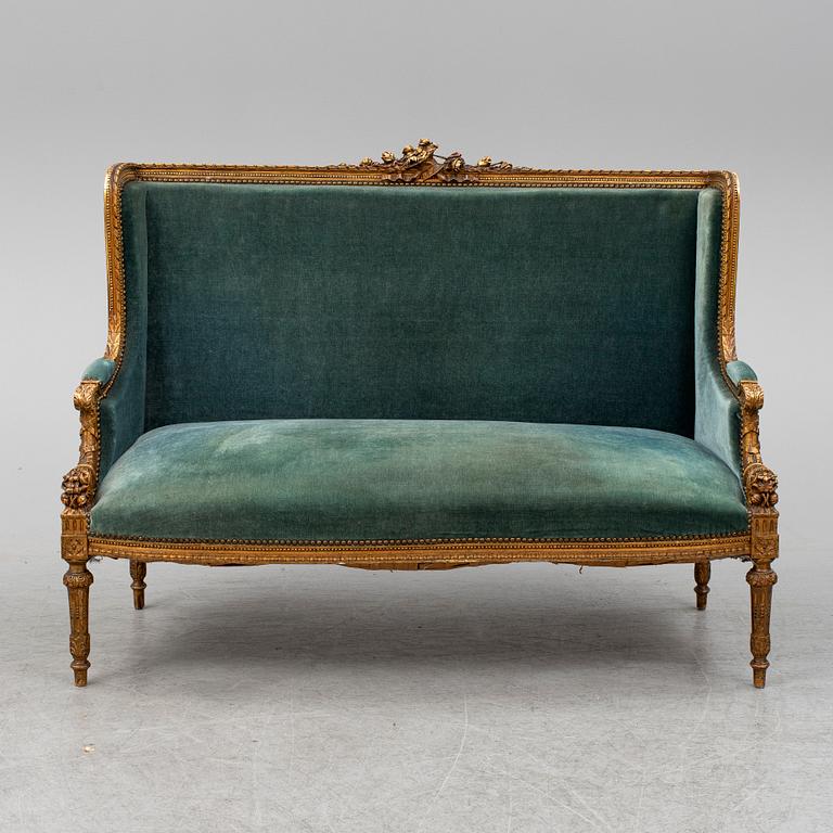 A Louis XVI-style sofa, ca 1900.