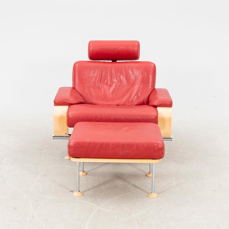 A Folke Fribyter leather armchair and fotstool 'Leo' from Nelo Knislinge around year 2000.