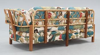 A Josef Frank mahogany and rattan daybed, Svenskt Tenn, model 2145.