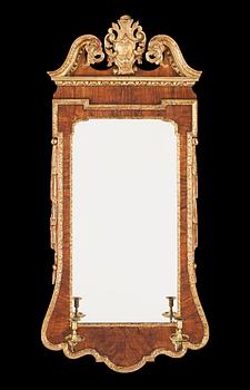 480. An English late Baroque 18th century two-light girandole mirror.