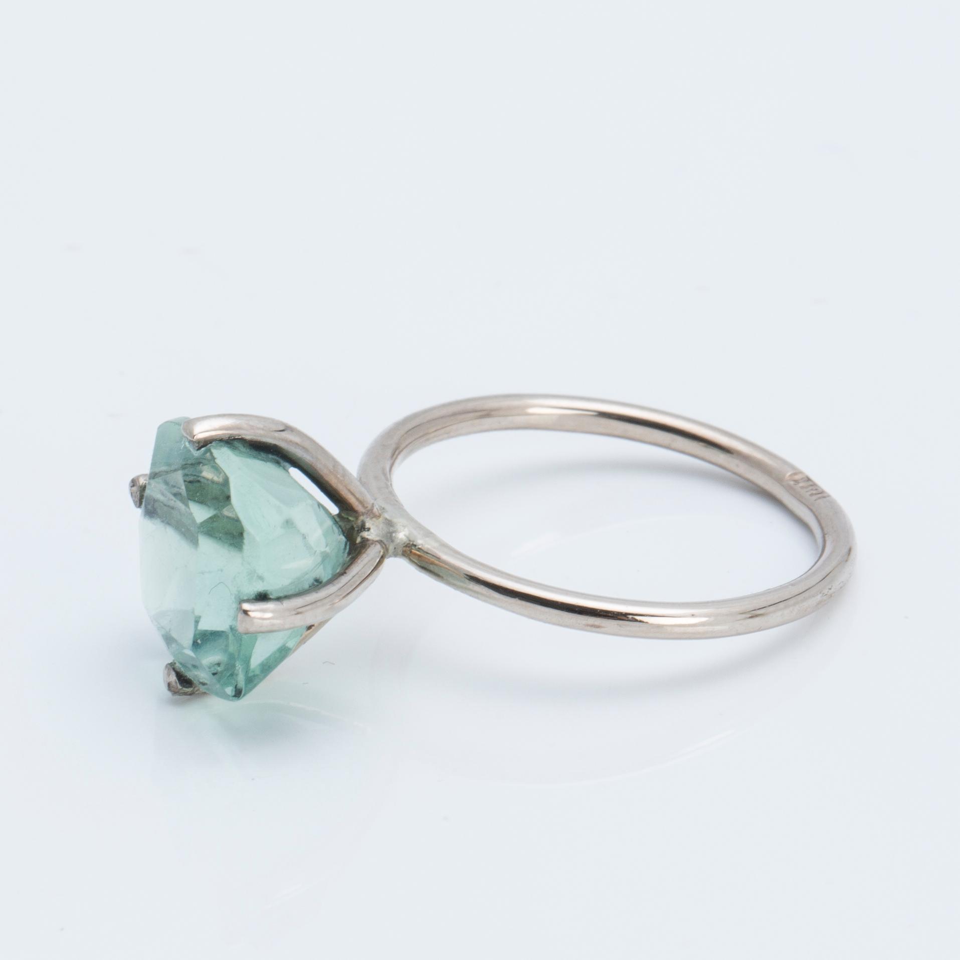 A faceted fluorit ring.