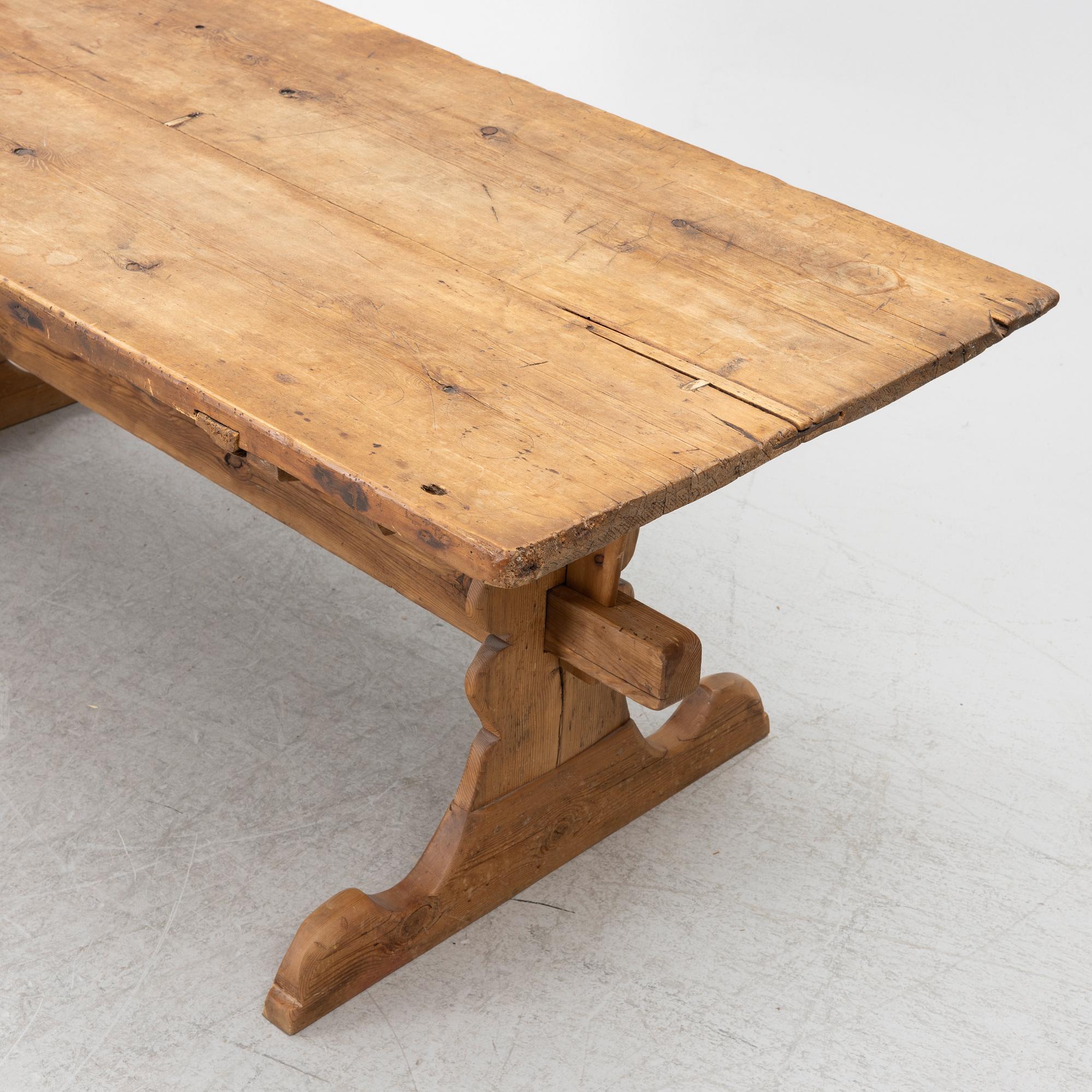 A 19th century pine table.