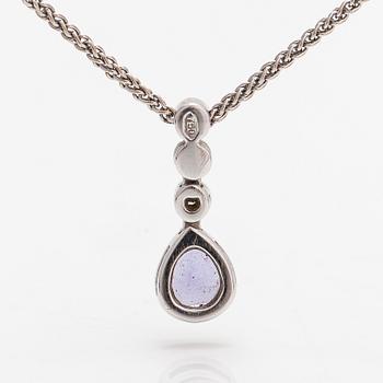 An 18K white gold necklace with a tanzanite and diamonds ca. 0.06 ct in total.