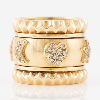 Ring in 18K gold with eight-cut diamonds, decorated with stars, hearts, and moons.
