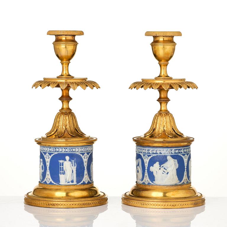 A pair of George III ormolu and jasperware candlesticks, late 18th century.