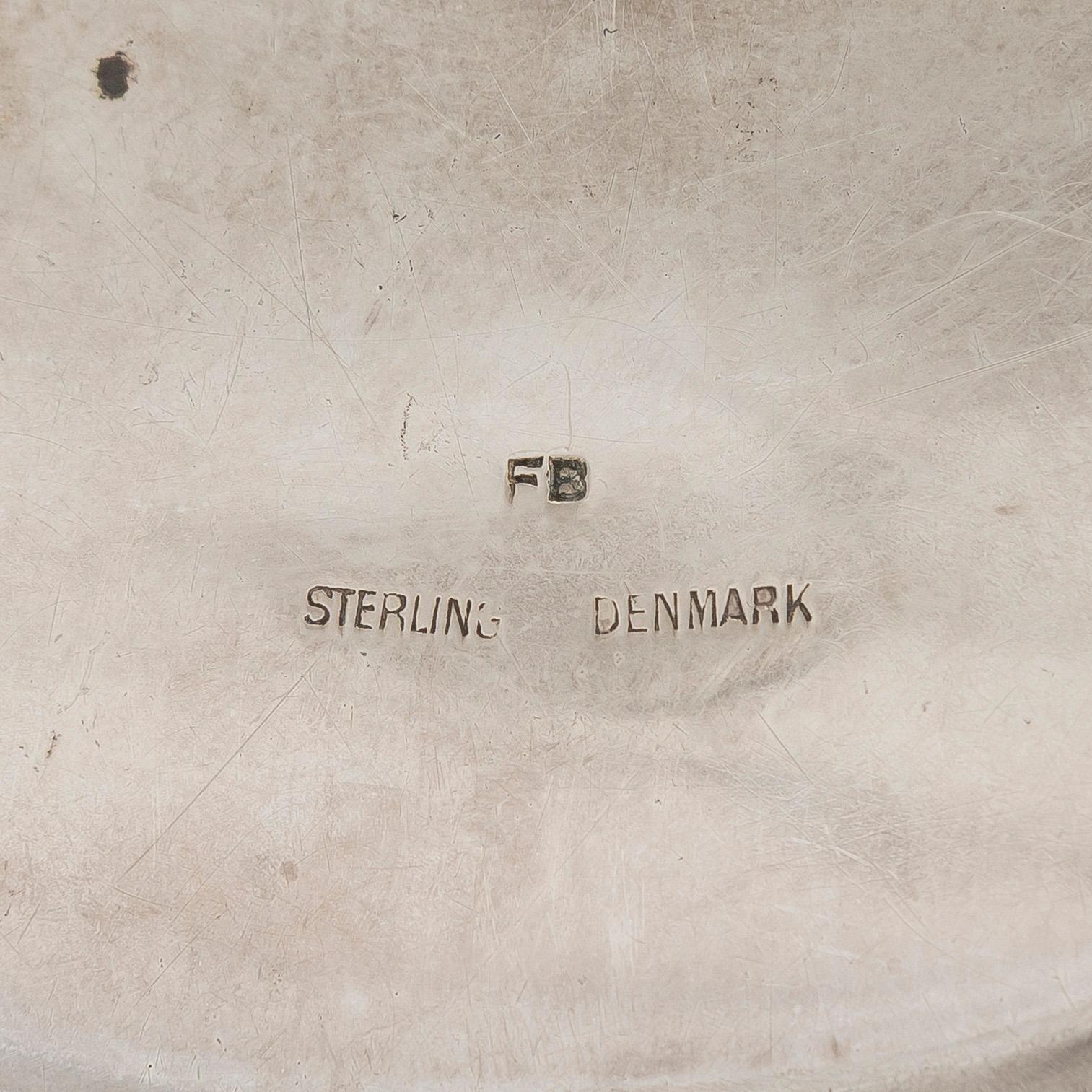 A pair of Danish sterling silver decanter coasters, maker's mark FB.