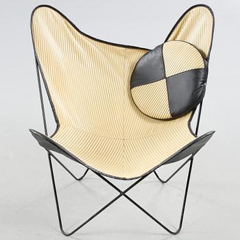 A chair, so called bat chair, made in the mid 20th century.