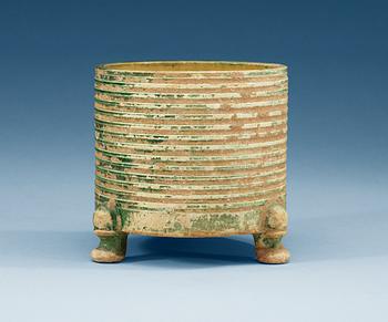 A green and yellow glazed tripod censer, Tang dynasty (618-907).