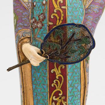 A cloisonné enamel Figurin from China, 1900s.