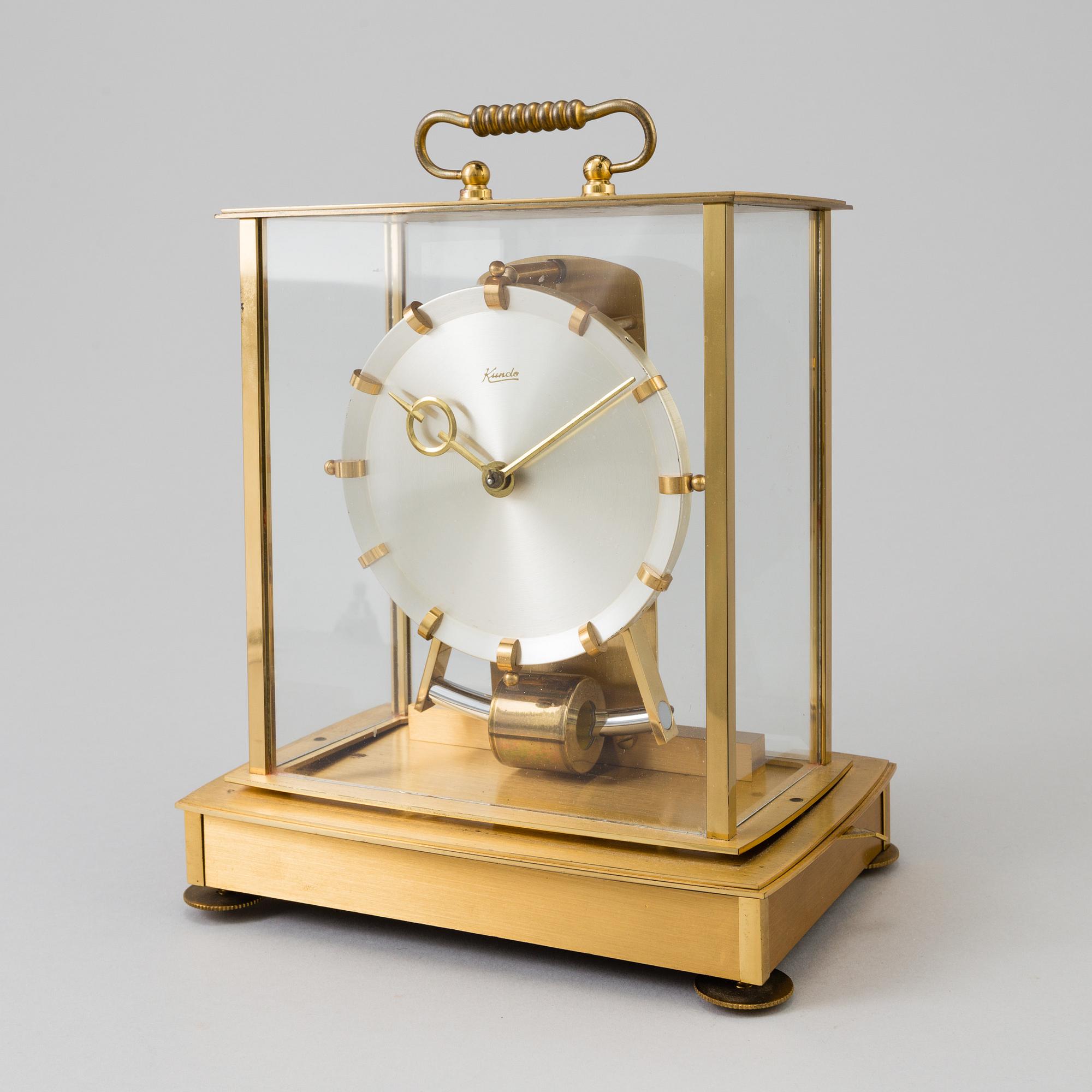 A table clocks, brass, Kundo, 20th century.