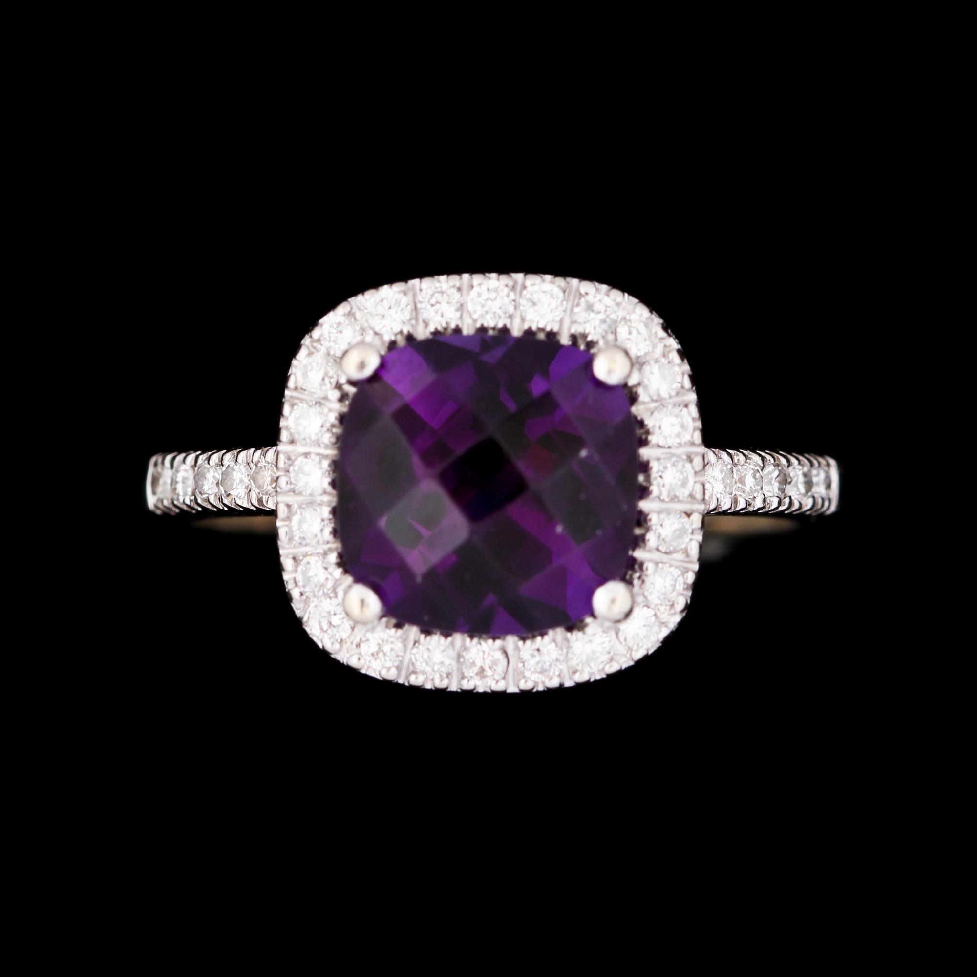 RING, 14K vitguld med checkerslipad ametist samt små briljantslipade diamanter. Vikt 3,6 g.