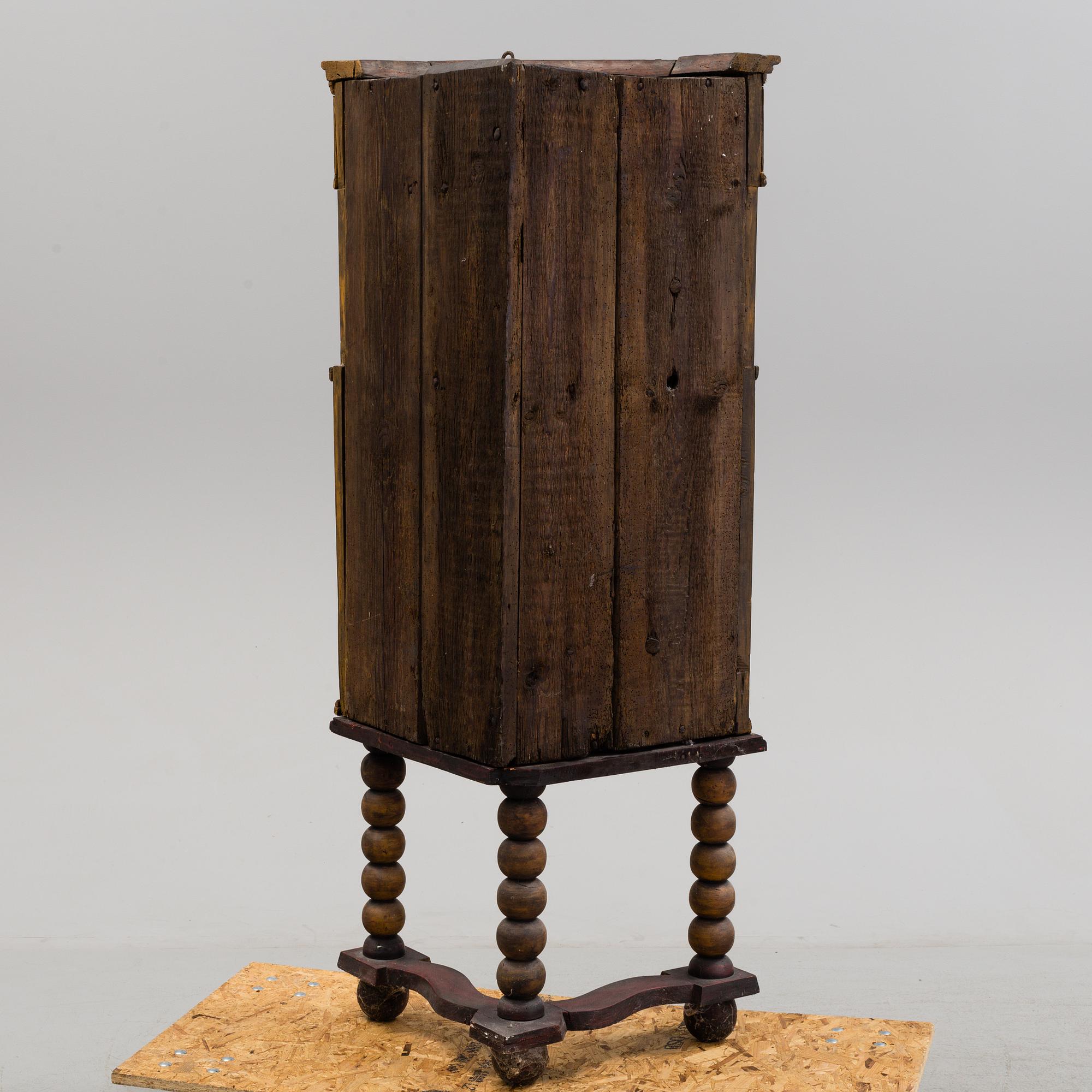 A 18th century corner cabinet.