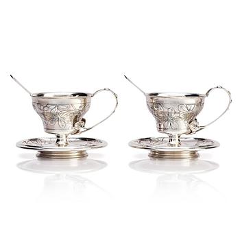 311. A pair of Russian Silver Teacups with Saucers and Spoons, Teodor Werner & Co, probably Warzaw 1899-1904.