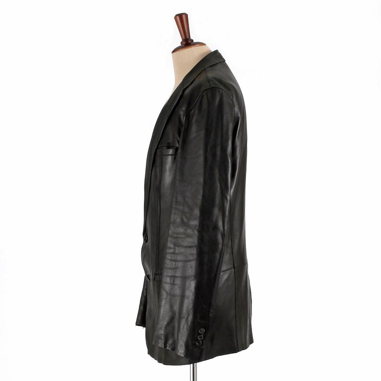 GUCCI, a men's black leather jacket, size 50.