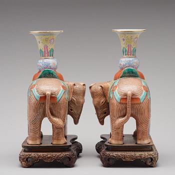 A pair of famille rose caparisoned elephants, Qing dynasty, Jiaqing (1796-1822).