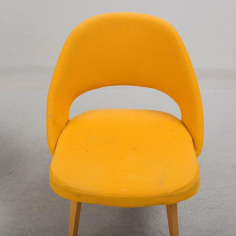 A group eight of Eero Saarinen executive side chair with wood legs, Knoll Products inc.