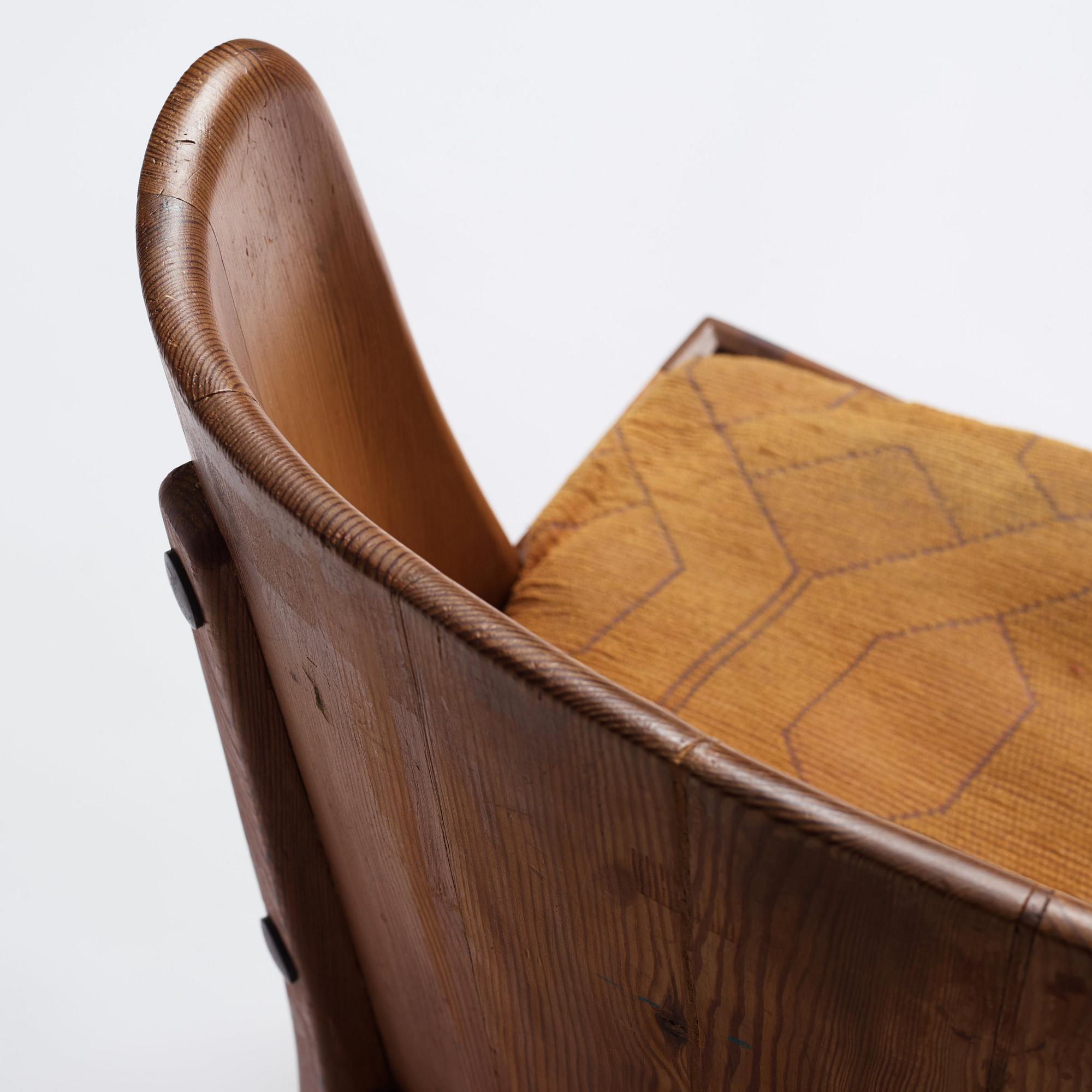 Axel Einar Hjorth, a pair of stained pine 'Lovö' chairs, Nordiska Kompaniet, Sweden 1930s.