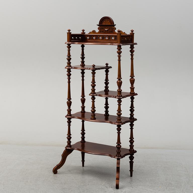 A mid 20th century mahogany etagere.