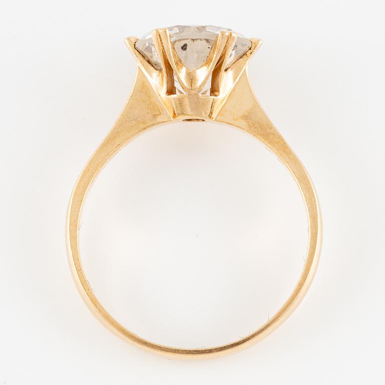 Ring 18K gold with a round brilliant-cut diamond.
