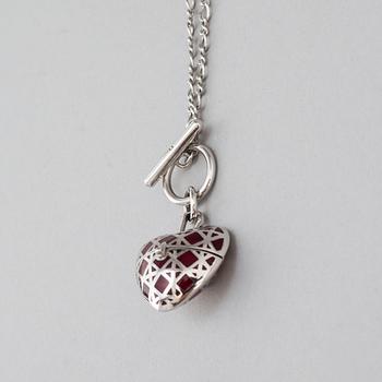 A Christian Dior costume jewelry pendant.