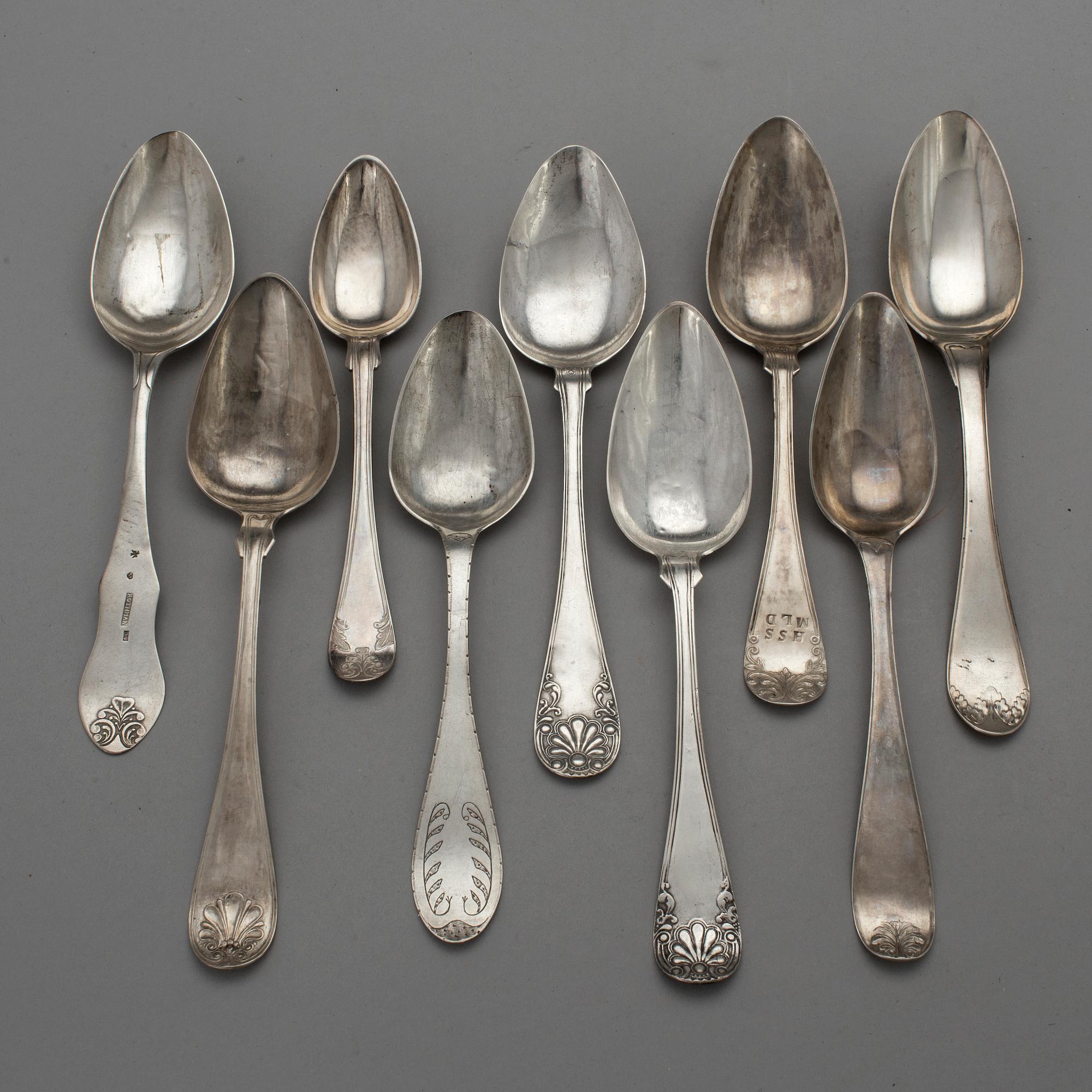 NINE 19TH CENTURY SILVER TABLE SPOONS.